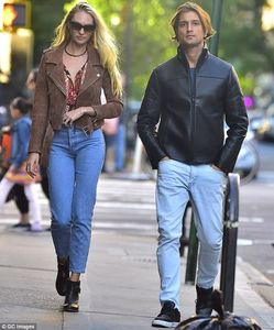 3FEA887500000578-4472332-Model_couple_Candice_Swanepoel_stepped_out_with_fiance_Hermann_N-a-107_1493